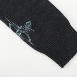 Close-up detail shot of Louis Vuitton luxury clothing with relaxed-fit cut