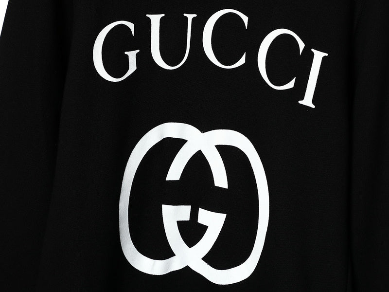Flat lay presentation of Gucci luxury clothing with tailored silhouette