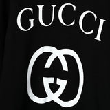 Flat lay presentation of Gucci luxury clothing with tailored silhouette
