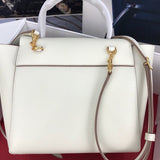 Back view of statement structured women's handbag – women's luxury accessory