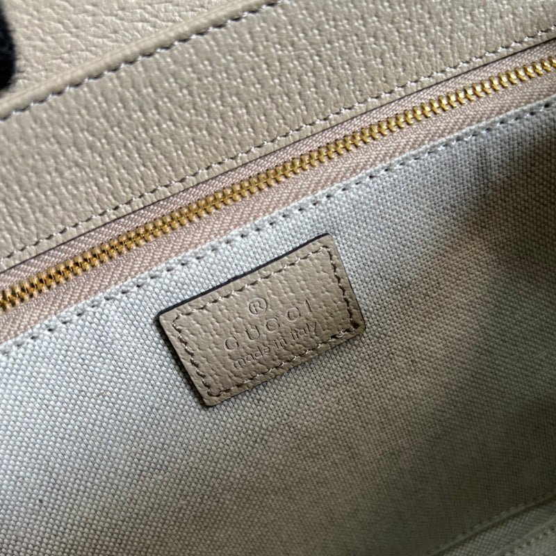 Side profile of refined premium women's handbag – women's luxury accessory