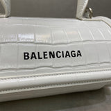 Timeless Vegan Leather Handbag - Polished Finish | Women's Designer-Inspired Purse #842 - styled full view (image 7) of designer-inspired handbag