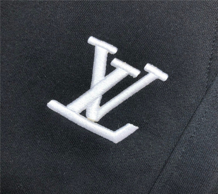Flat lay presentation of Louis Vuitton cotton t-shirt with label-forward styling