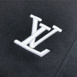 Flat lay presentation of Louis Vuitton cotton t-shirt with label-forward styling
