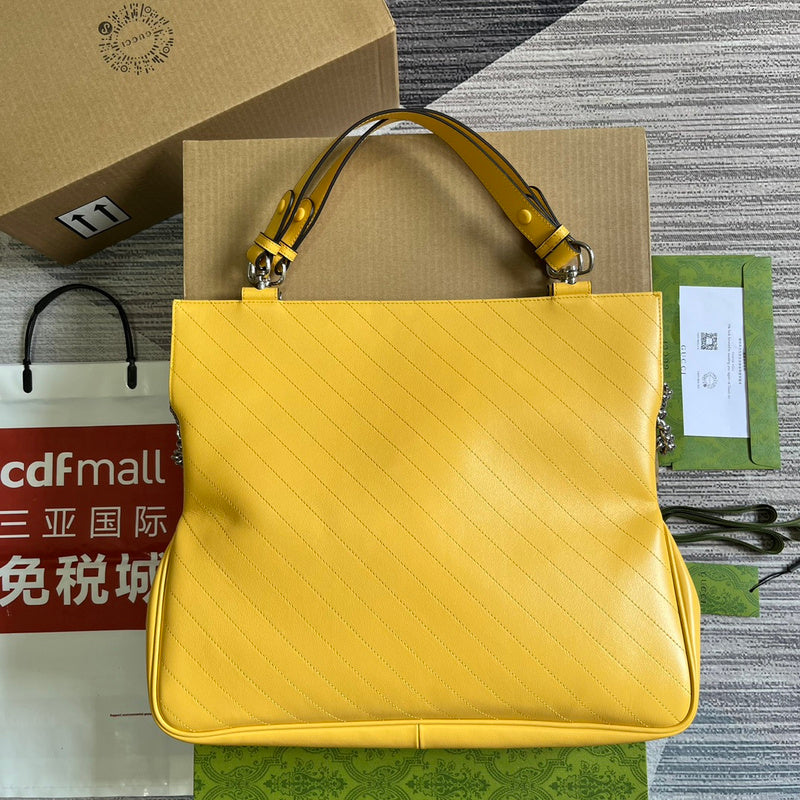Handle and strap detail of classic chic women's handbag – women's luxury handbag