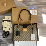 Front view of refined elevated women's handbag – women's statement bag