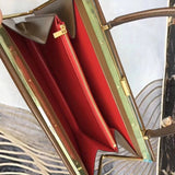 Side profile of everyday-luxe statement women's handbag – women's luxury handbag