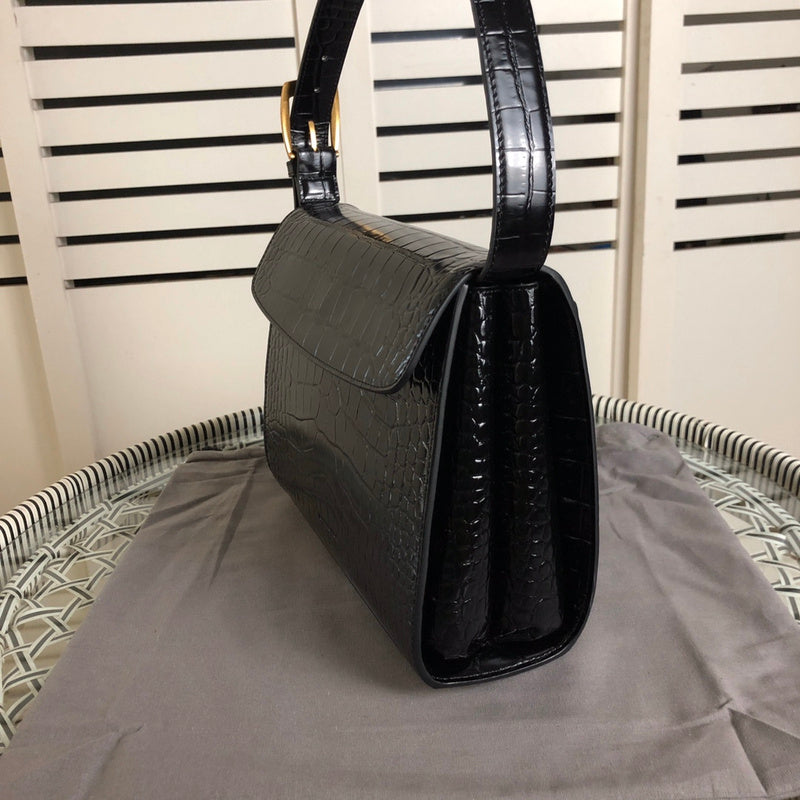 Back view of modern refined women's handbag – women's luxury handbag