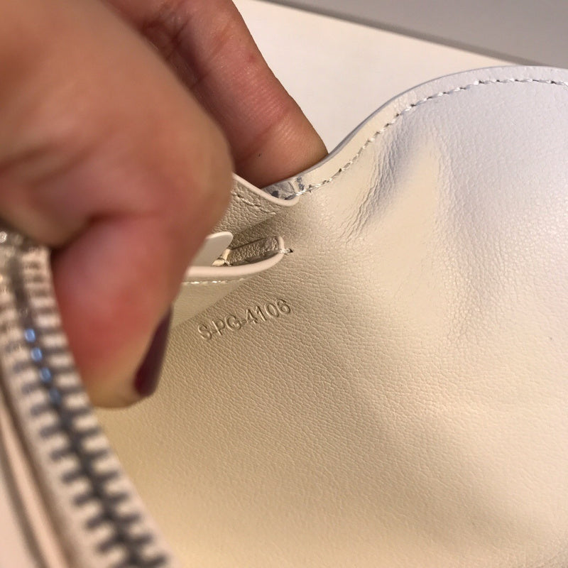 Styled lifestyle shot of premium polished women's handbag – women's designer-style accessory