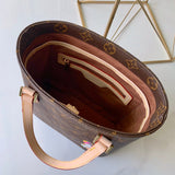 Close-up detail of everyday-luxe modern women's handbag – women's luxury accessory