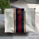 Handle and strap detail of classic signature women's handbag – women's designer-style accessory
