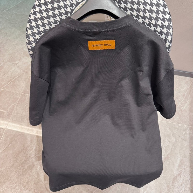 Side profile of Louis Vuitton cotton t-shirt with monogram-inspired silhouette