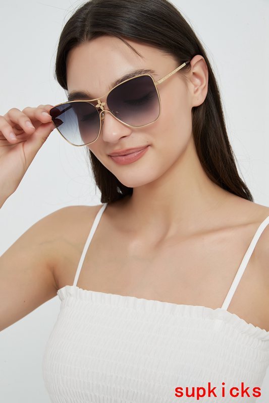 Close-up detail view of Louis Vuitton unisex sunglasses