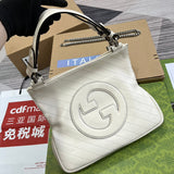 Handle and strap detail of chic refined women's handbag – women's luxury accessory