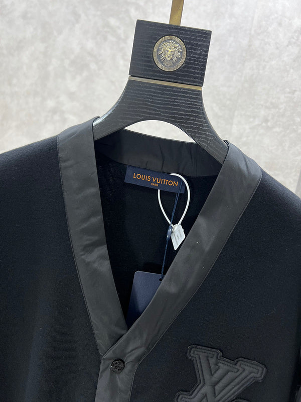 Close-up detail shot of Louis Vuitton luxury clothing with runway-inspired design