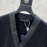 Close-up detail shot of Louis Vuitton luxury clothing with runway-inspired design