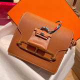 Side view of understated structured handbag