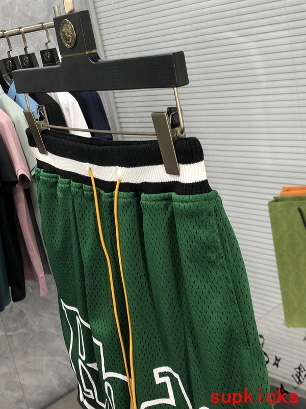 Flat lay presentation of Rhude luxury clothing with everyday silhouette