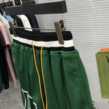Flat lay presentation of Rhude luxury clothing with everyday silhouette
