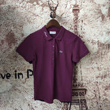 Back view of Lacoste luxury clothing with signature branding