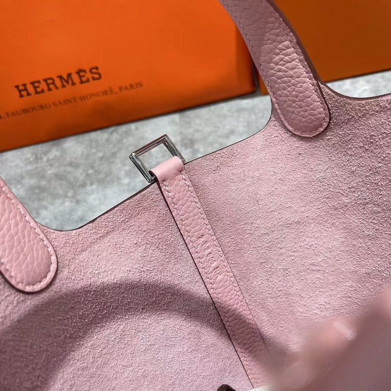 Side view of streamlined structured handbag