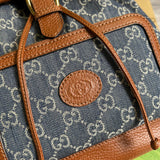 Styled lifestyle shot of elevated polished women's handbag – women's luxury accessory