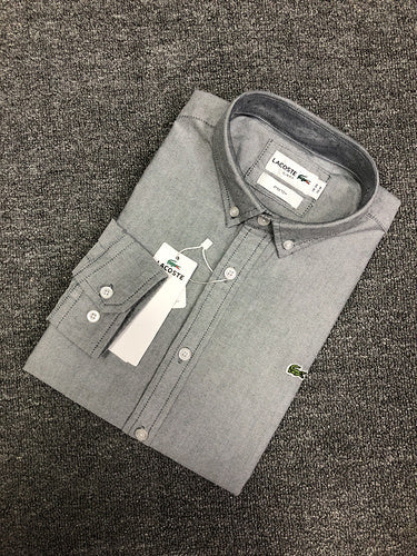 Close-up detail shot of Lacoste luxury clothing with logo-detail design