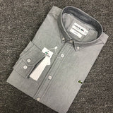 Close-up detail shot of Lacoste luxury clothing with logo-detail design