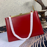 Close-up detail of chic sleek women's handbag – women's luxury accessory