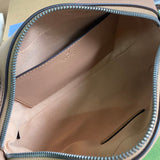 Side profile of everyday-luxe sleek women's handbag – women's statement bag
