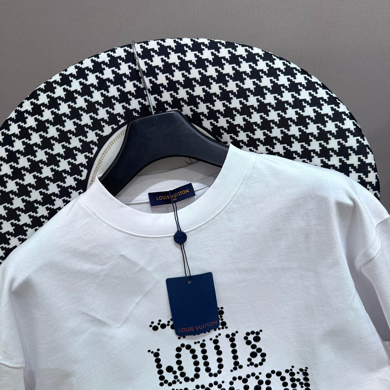 Flat lay presentation of Louis Vuitton cotton t-shirt with monogram-inspired silhouette