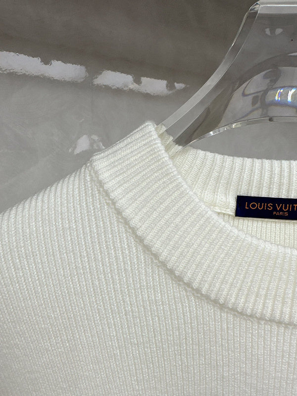 Close-up detail shot of Louis Vuitton luxury clothing with relaxed-fit cut