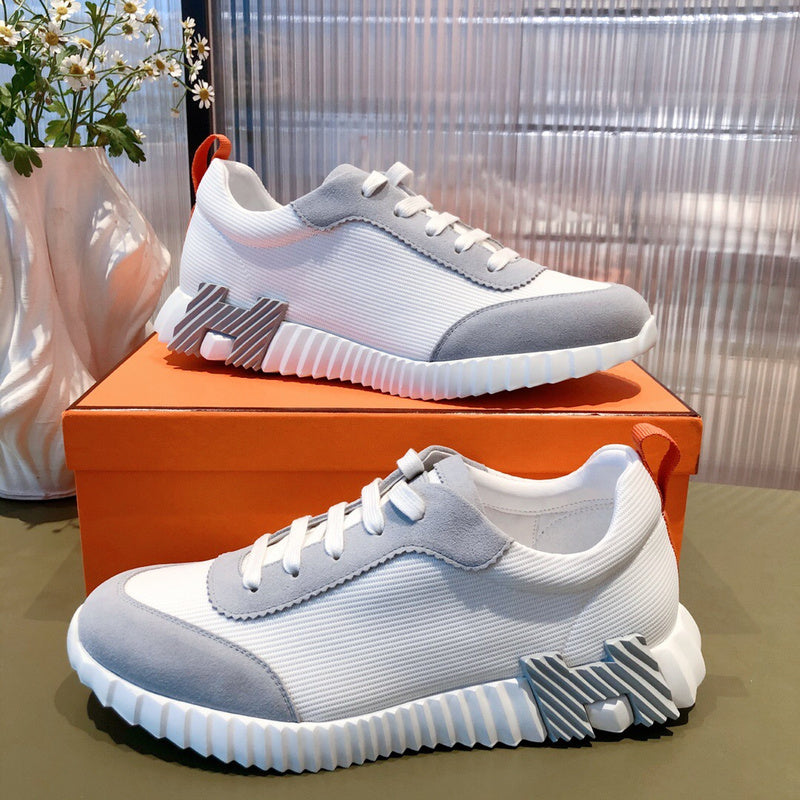 Hermès White High-Top Sneakers - Studio Shot