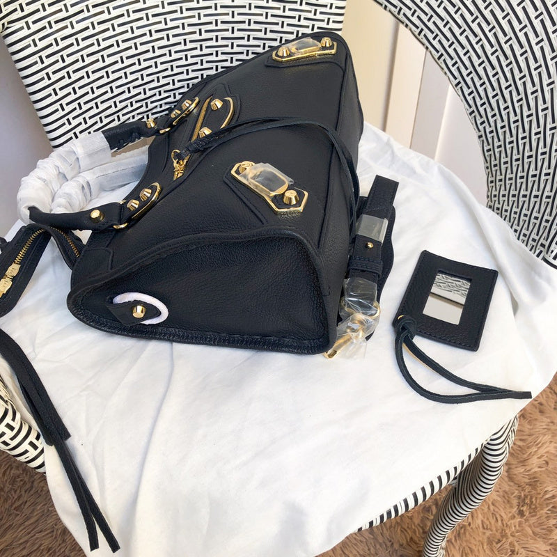 Styled lifestyle shot of polished elevated women's handbag – women's luxury accessory