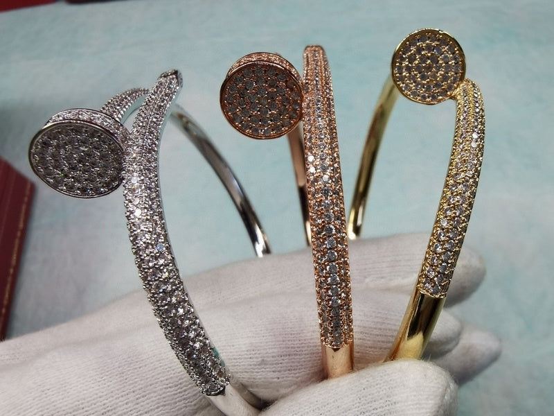 Side view of Cartier unisex jewelry piece