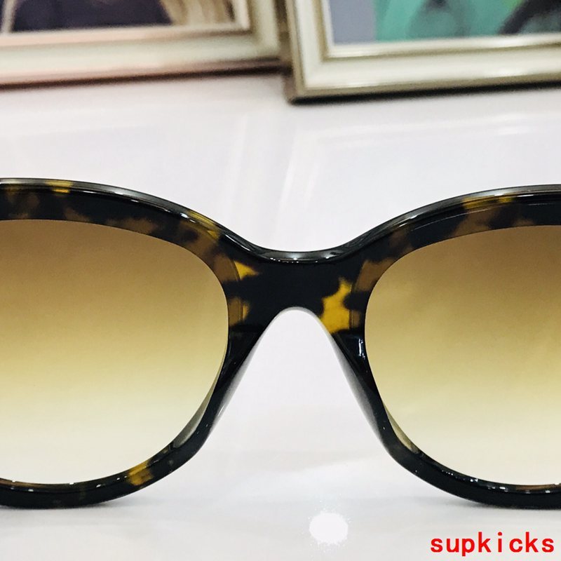 Close-up detail view of Louis Vuitton unisex sunglasses