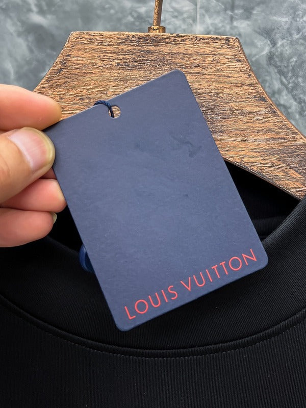 Close-up detail shot of Louis Vuitton luxury clothing with everyday silhouette