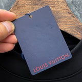 Close-up detail shot of Louis Vuitton luxury clothing with everyday silhouette