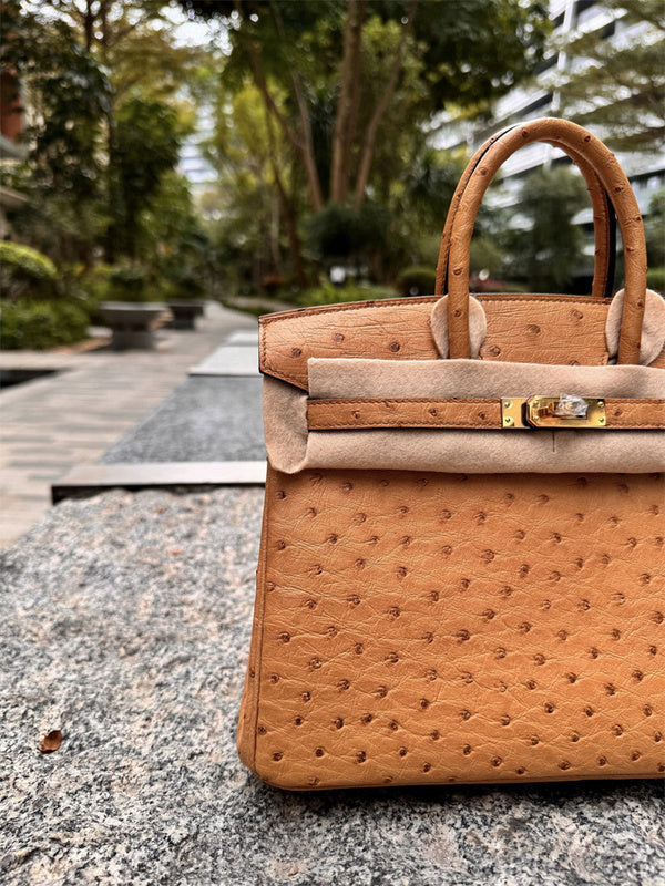 Side view of modern structured handbag