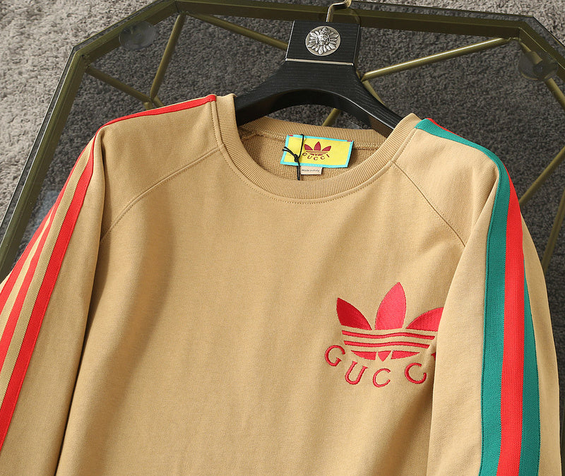 Close-up detail shot of Gucci luxury clothing with signature branding