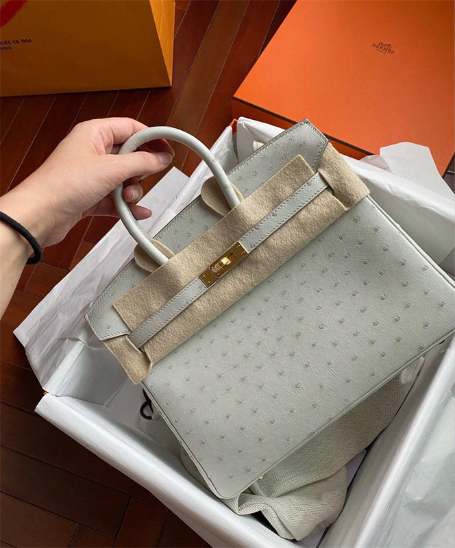 Side view of elegant structured handbag