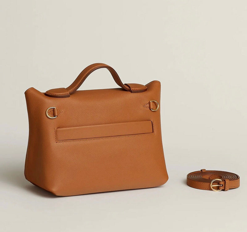 Side view of tailored structured handbag