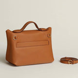 Side view of tailored structured handbag