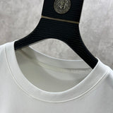 Close-up detail shot of Givenchy luxury clothing with everyday silhouette