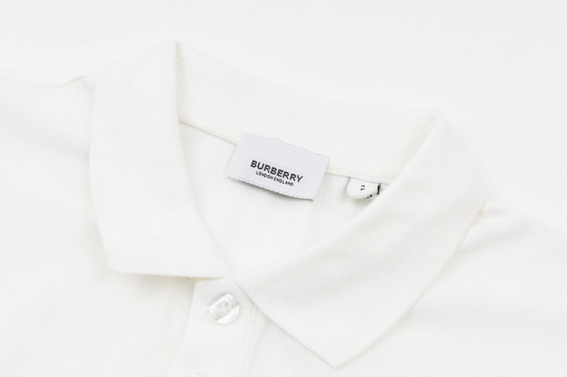 Close-up detail shot of Polo cotton polo shirt with monogram-inspired silhouette