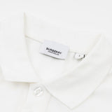 Close-up detail shot of Polo cotton polo shirt with monogram-inspired silhouette