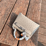 Close-up detail of polished bag design