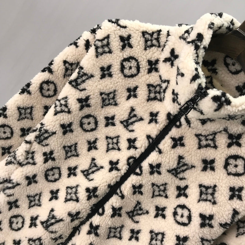 Full styled look of Louis Vuitton luxury clothing with logo-detail design
