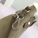 Handle and strap detail of premium everyday-luxe women's handbag – women's statement bag