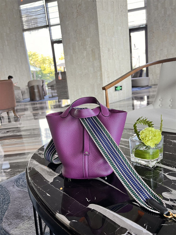 Side view of sculpted structured handbag